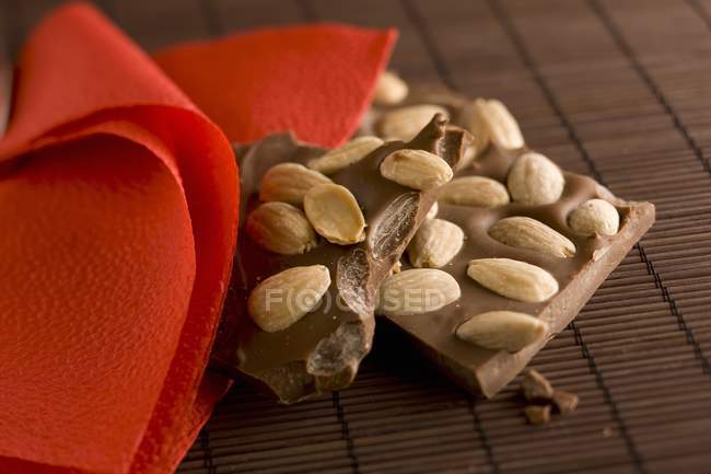 Bar of almond chocolate — Stock Photo