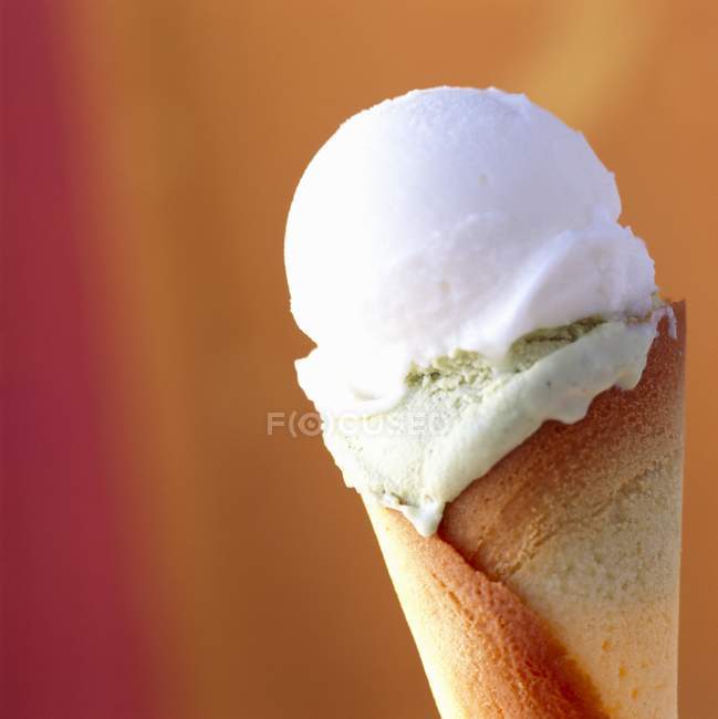 Cone with scoops of ice cream — Stock Photo
