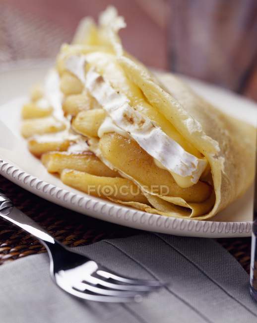 Pancake filled with camembert — Stock Photo