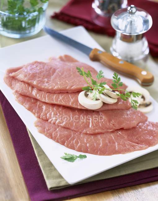 Raw veal escalope — Stock Photo