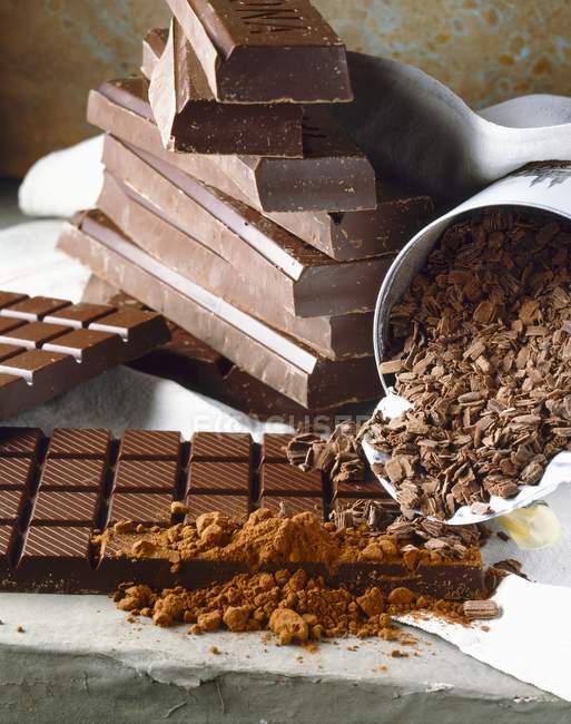 Whole and grated Chocolate — Stock Photo