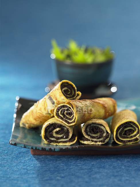 Omelette rolls filled with tapenade — Stock Photo