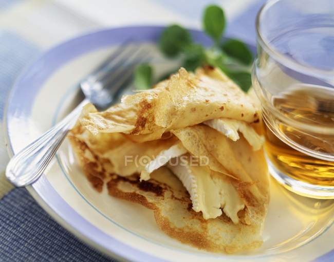 Camembert crepes on plate — Stock Photo