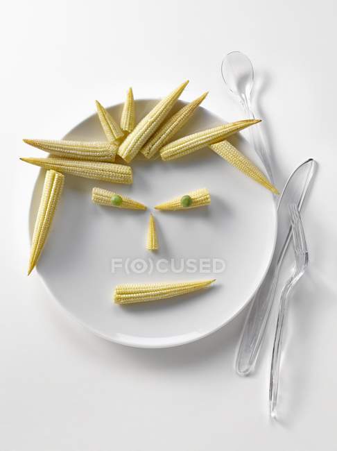 Plate of mini corn — Stock Photo