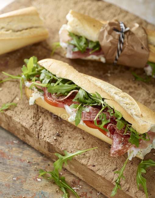 Rustic baguette with ham — Stock Photo