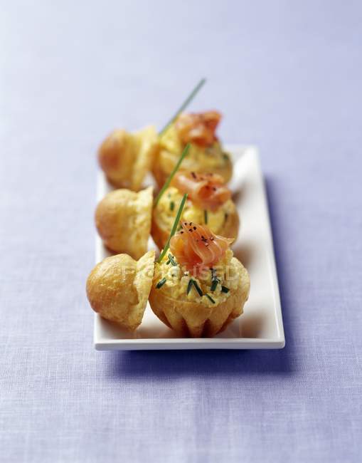 Brioches stuffed with scrambled egg and salmon — Stock Photo