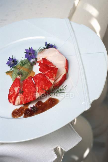 Lobster in aspic with broccoli sauce  on white plate — Stock Photo