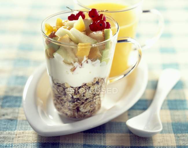 Fromage blanc with muesli and fruit salad — Stock Photo
