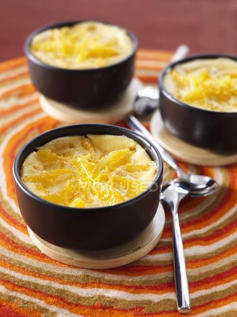 Clementine and ginger baked egg custards — Stock Photo