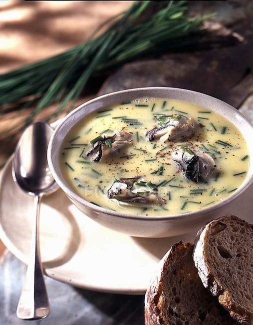 Seafood soup with oysters — Stock Photo