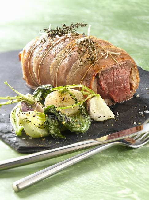 Beef fillet wrapped in lard — Stock Photo