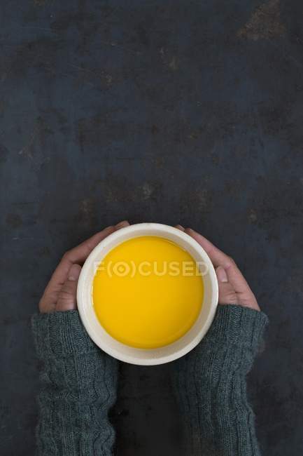 Female Hands holding cup of tea — Stock Photo