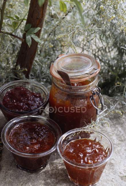 Fig jam in glasses and in jar — Stock Photo