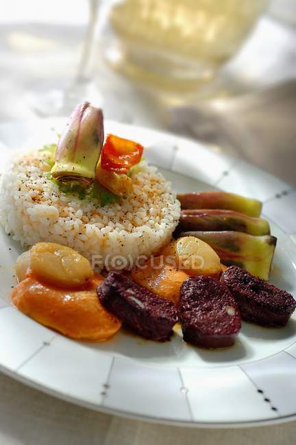 Rice with blood sausage — Stock Photo