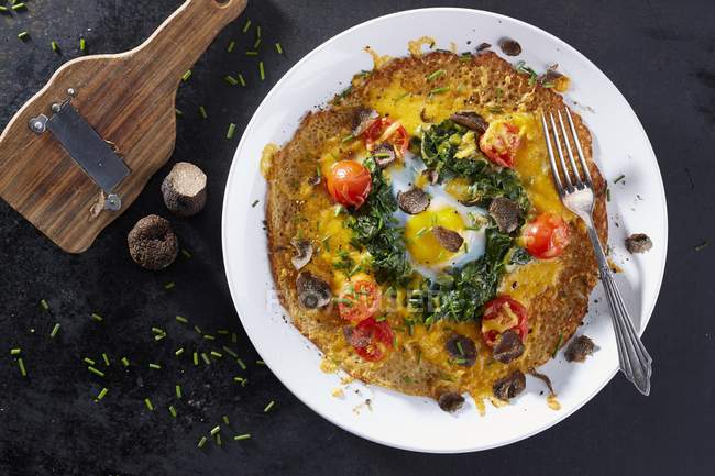 Galette with truffle on plate — Stock Photo