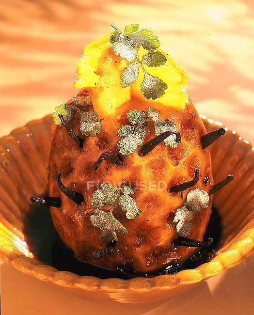 Closeup view of baked pineapple with candied coriander — Stock Photo