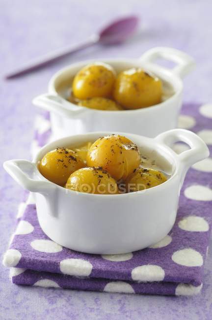 Spicy mirabelle plums in syrup — Stock Photo