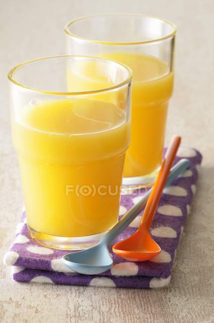 Glasses of orange juice — Stock Photo