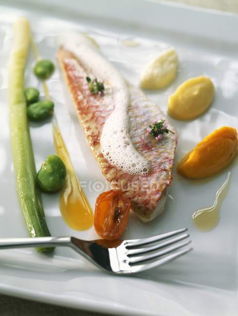 Fillet with carrot and orange mousse — Stock Photo