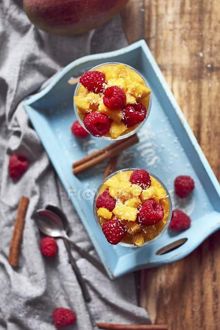 Rice with raspberries and mango — Stock Photo