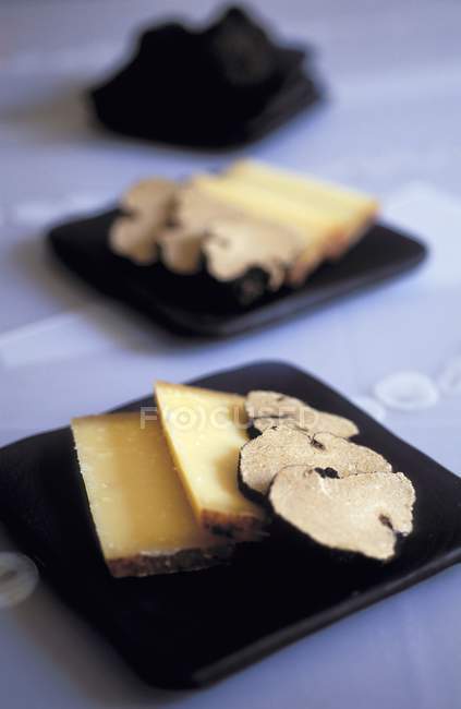 Comt cheese and truffles — Stock Photo