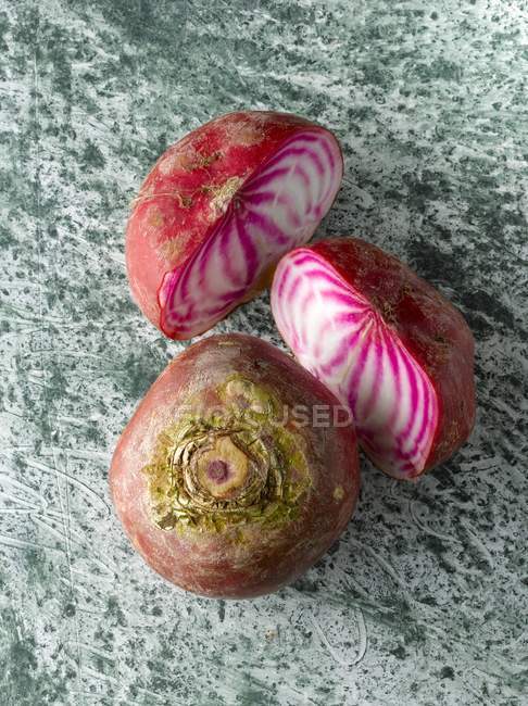 Whole and halved Beetroot — Stock Photo