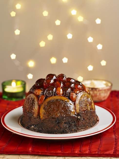 Christmas pudding with candied fruit — Stock Photo