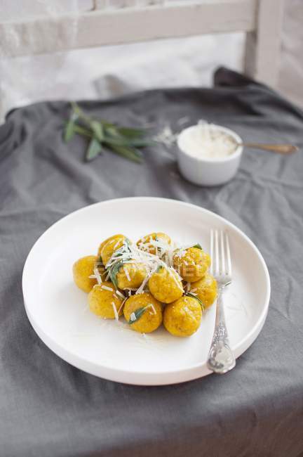 Pumpkin gnocchi with parmesan — Stock Photo