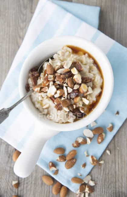 Almonds and maple syrup oats muesli — Stock Photo