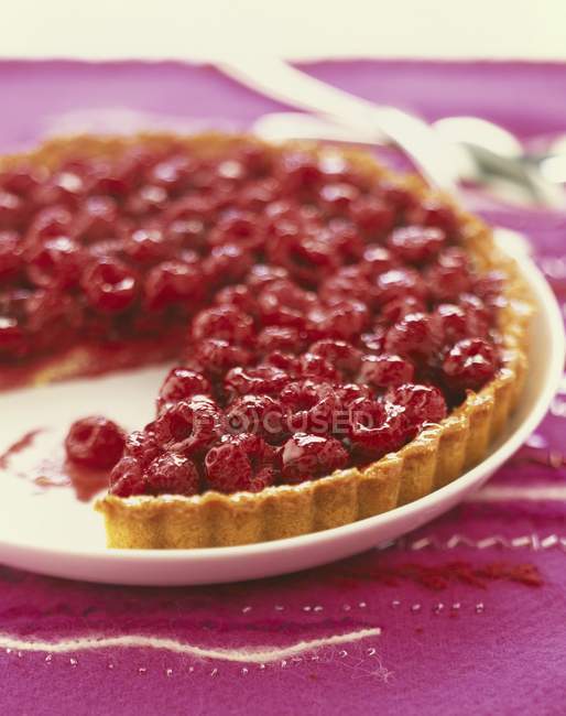 Partly-eaten Raspberry tart — Stock Photo