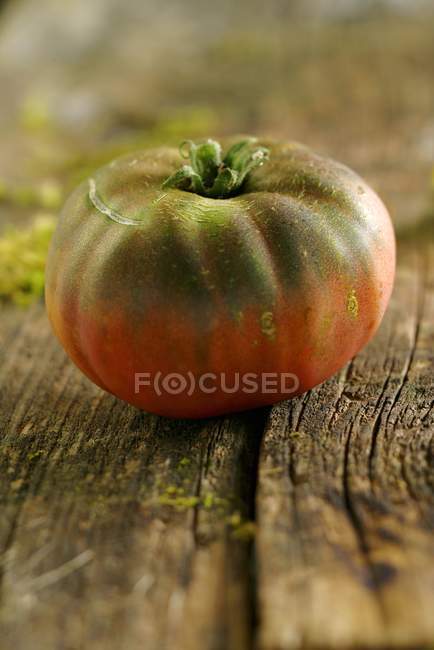 Crime black tomato — Stock Photo