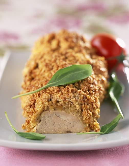 Pork filet mignon in oat crust — Stock Photo
