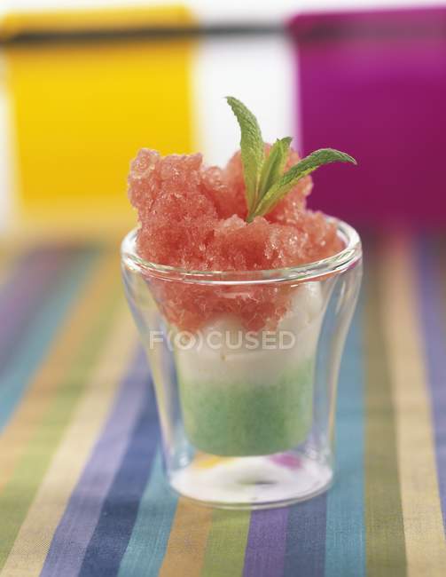 Closeup view of watermelon Granita with mint leaves and coconut — Stock Photo