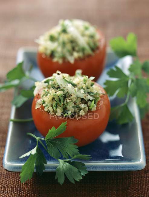 Tomatoes stuffed with couscous — Stock Photo