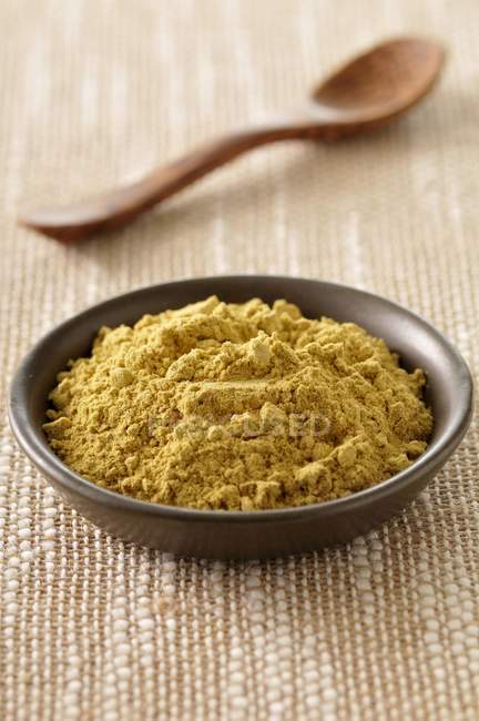 Ginger powder in bowl — Stock Photo