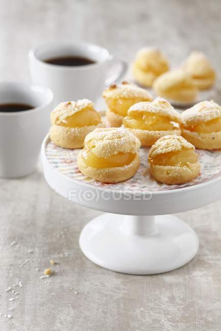 Lemon curd cream puffs — Stock Photo