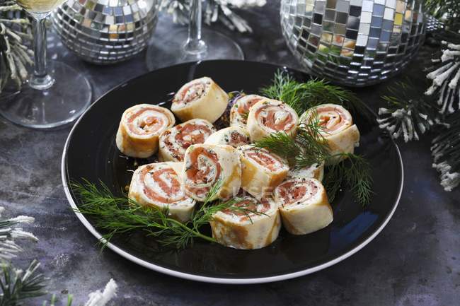 Smoked salmon rolls — Stock Photo