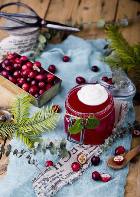 Cranberry jelly in glass jar — Stock Photo