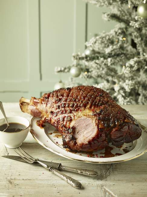 Christmas Ham on plate — Stock Photo