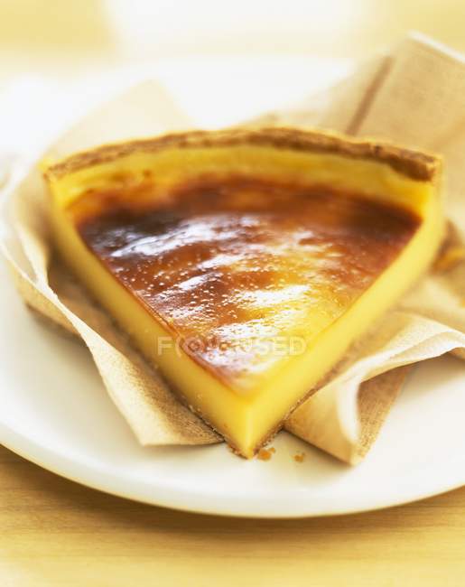 Slice of egg custard tart — Stock Photo