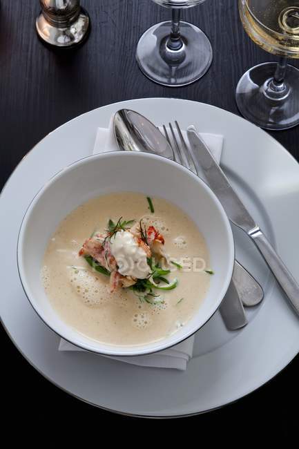 Top view of seafood soup with crayfish cream — Stock Photo