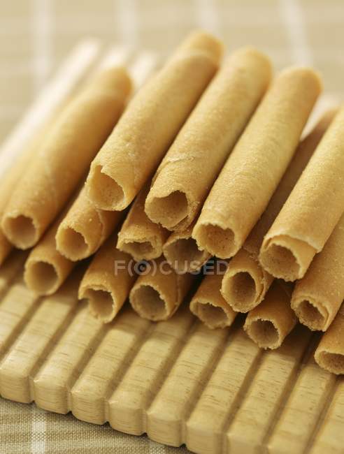 Rolled biscuits on tablecloth — Stock Photo