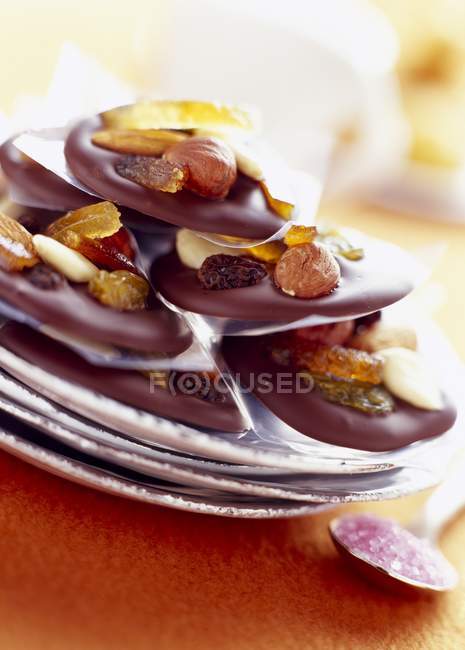 Mendiant almond on plates — Stock Photo