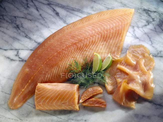 Slices and chops of salmon fish — Stock Photo