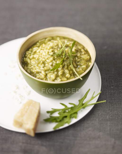 Risotto with rocket lettuce — Stock Photo