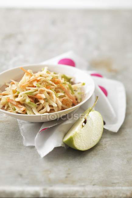 Carot, green apple and celeriac remoulade on white plate — Stock Photo