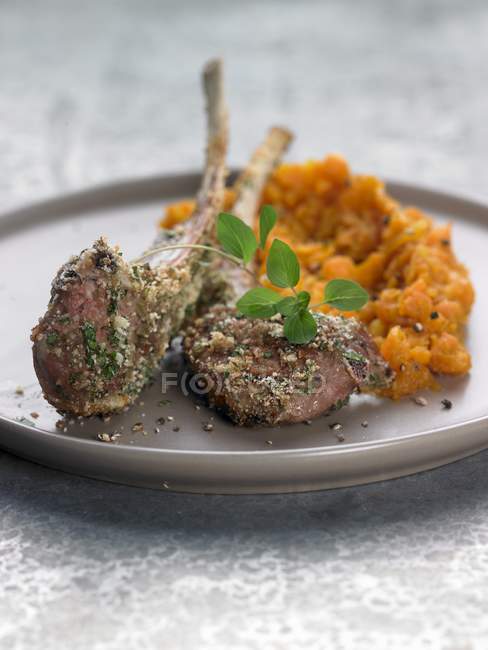 Lamb chops with carrot puree — Stock Photo