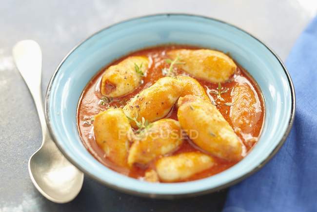Stuffed squids with sauce — Stock Photo