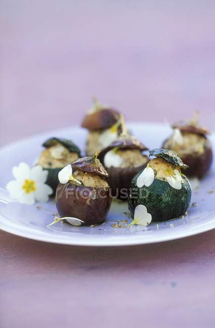Stuffed vegetables with primroses — Stock Photo