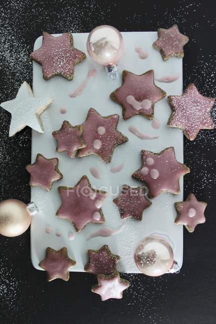 Star biscuits on board — Stock Photo
